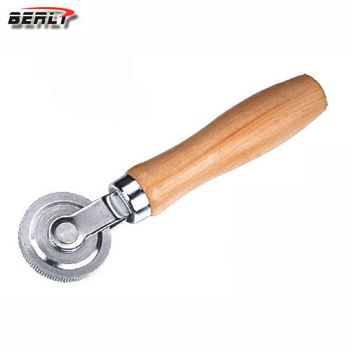 Roll for patches with a wooden handle