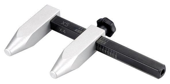 Caliper for measuring bolt spacing in wheels